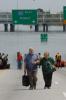 Local residents arrive at ramp to the Superdome after being rescued from their homes. New Orleans is being evacuated due to flooding caused by hurricane Katrina. Jocelyn Augustino/FEMA 