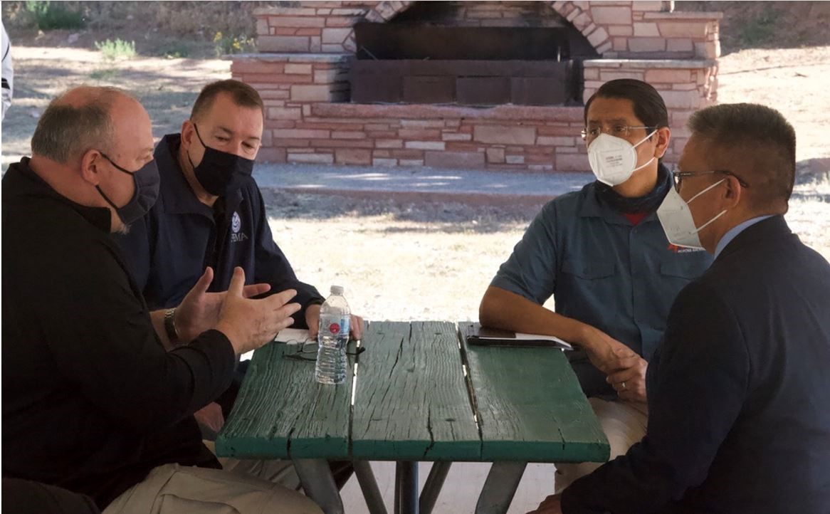 FEMA Administrator Pete Gaynor (both photos, 2nd from left) meets with Navajo Tribal leaders to discuss the Navajo Nation’s needs for the COVID-19 response and other emergency management priorities. Navajo Nation President Nez and Vice President Lizer are pictured at the table, along with FEMA Region 9 Administrator Bob Fenton. 