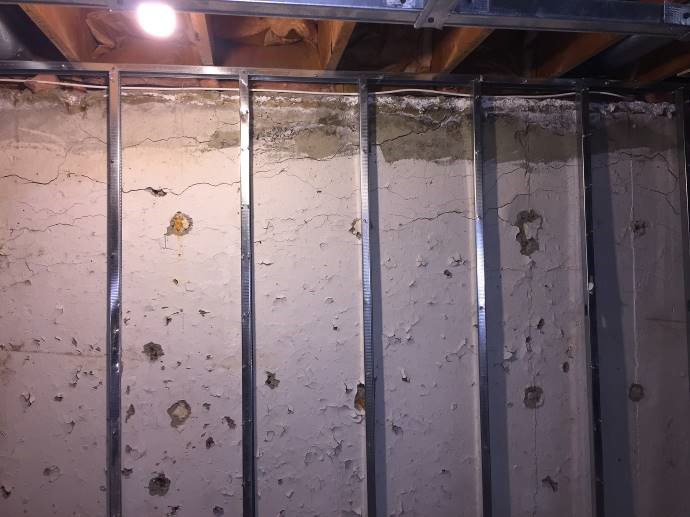 the foundation of a home crumbling