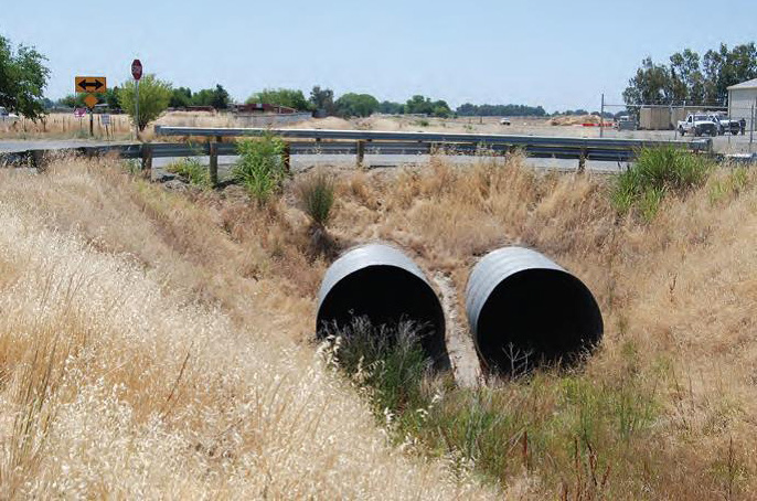 Dual 96-inch diameter, 95-foot long corrugated metal pipe culvert.