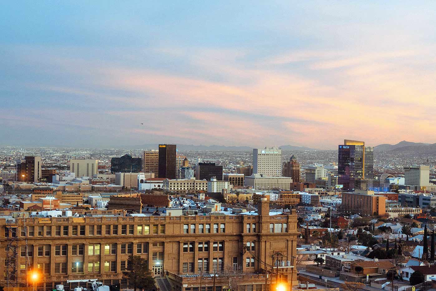 Buildings and horizon during sunset