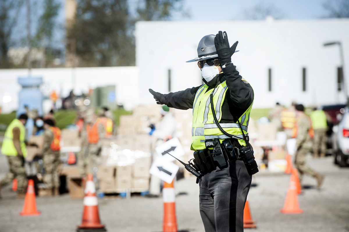 A Ohio state trooper directs traffic.