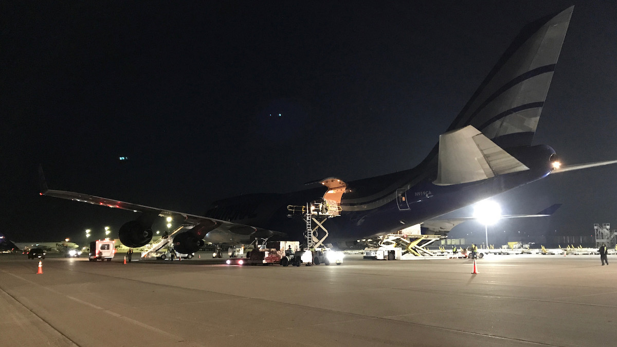 Cargo is unloaded from a cargo plane.