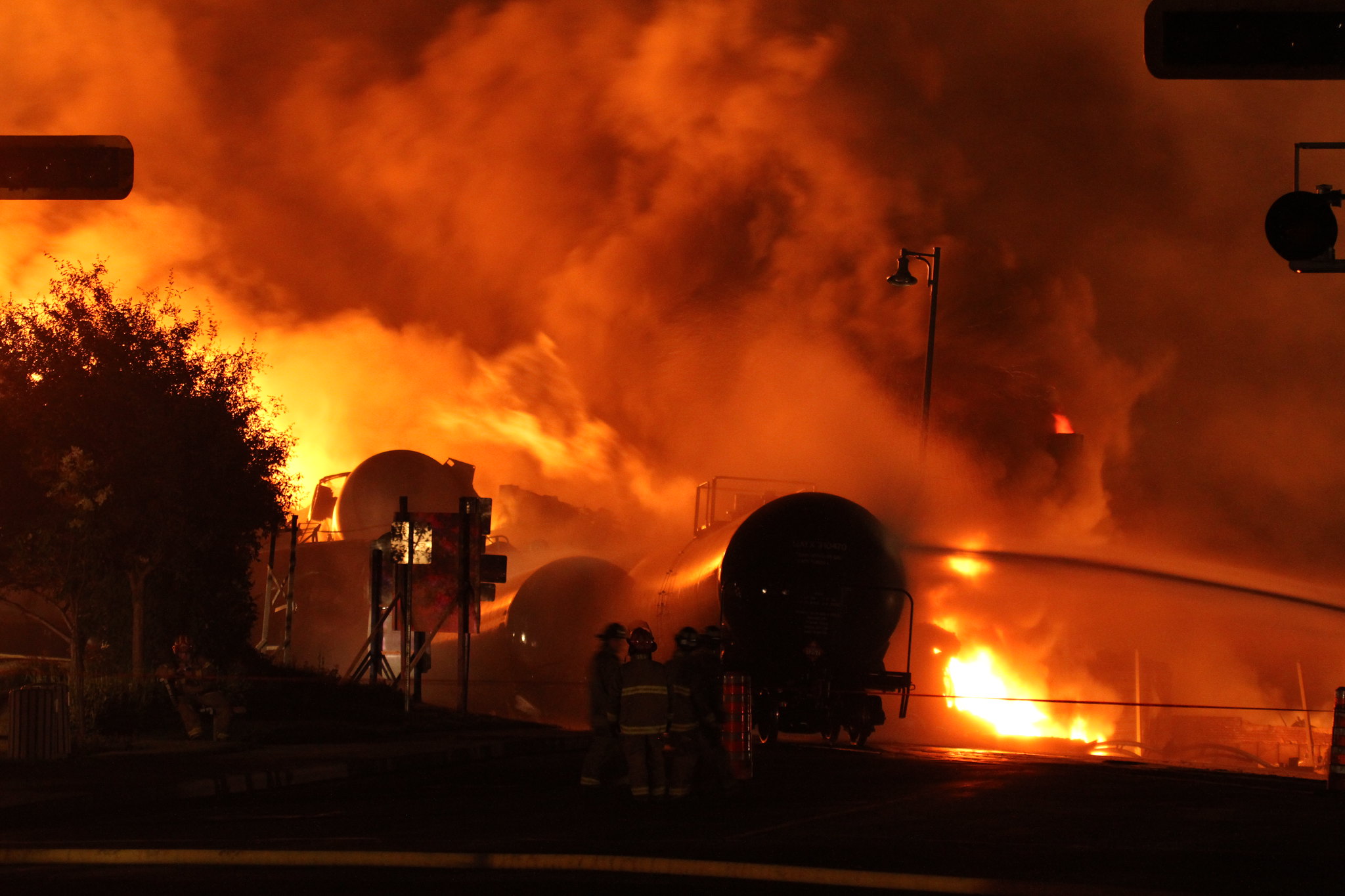 Orange and red sky coming off the fire from a train detrailment