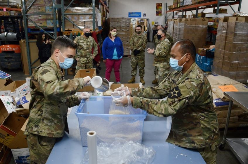 6 soldier working a food bank