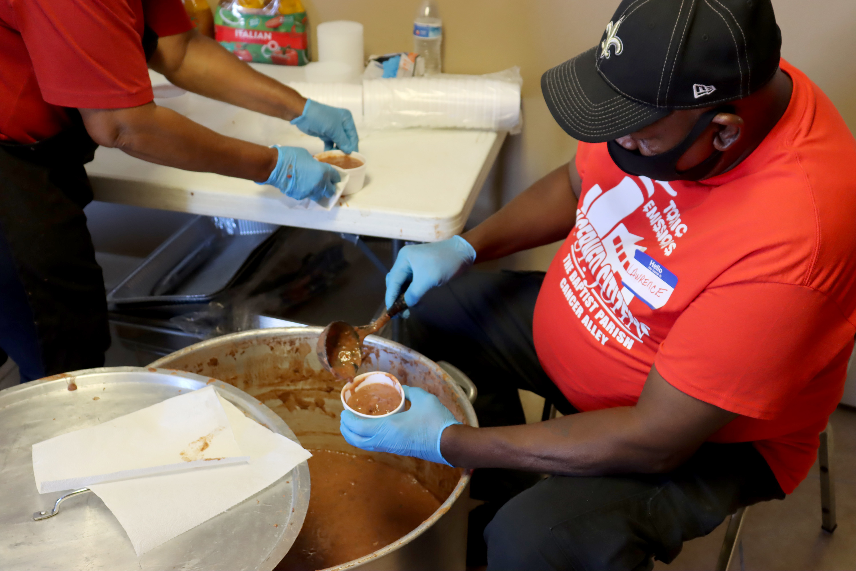 Volunteers put together hot lunches at the Tchoupitoulas Chapel to feed those affected by Hurricane Ida. 