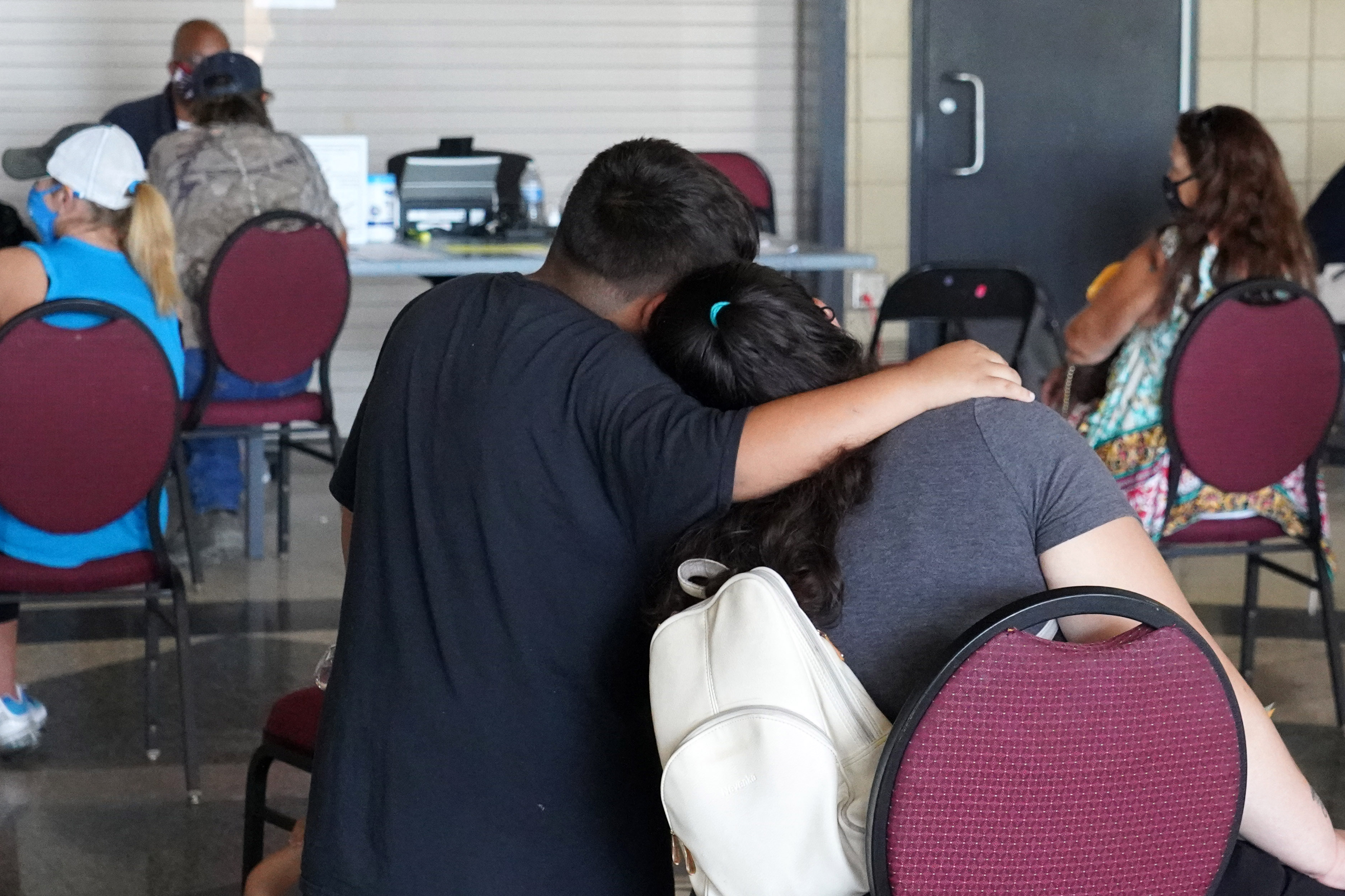 Mother and son at a Disaster Recovery Center, where survivors affected by Hurricane Ida can get help with their disaster assistance applications, upload documents and get questions answered. Representatives from the U.S. Small Business Administration (SBA) are also on hand to provide program information and explain how to apply for SBA’s low-interest disaster loans for businesses, private nonprofits, homeowners and renters.