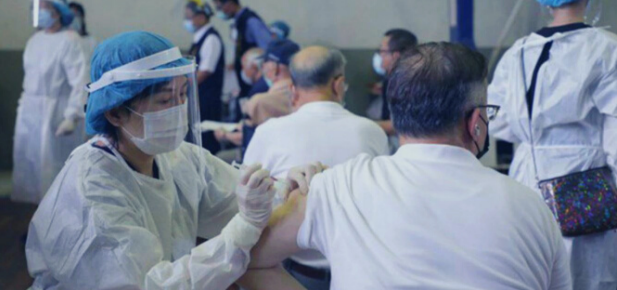 Clinical volunteers support vaccination efforts.