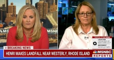 FEMA Administrator Deanne Criswell speaking with a female reporter 