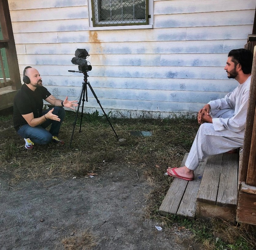 Ricardo interviewing one of the Afghan guests during Operation Allies Welcome.