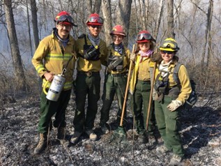 Duffy and other AmeriCorps members during a prescribed burn. 