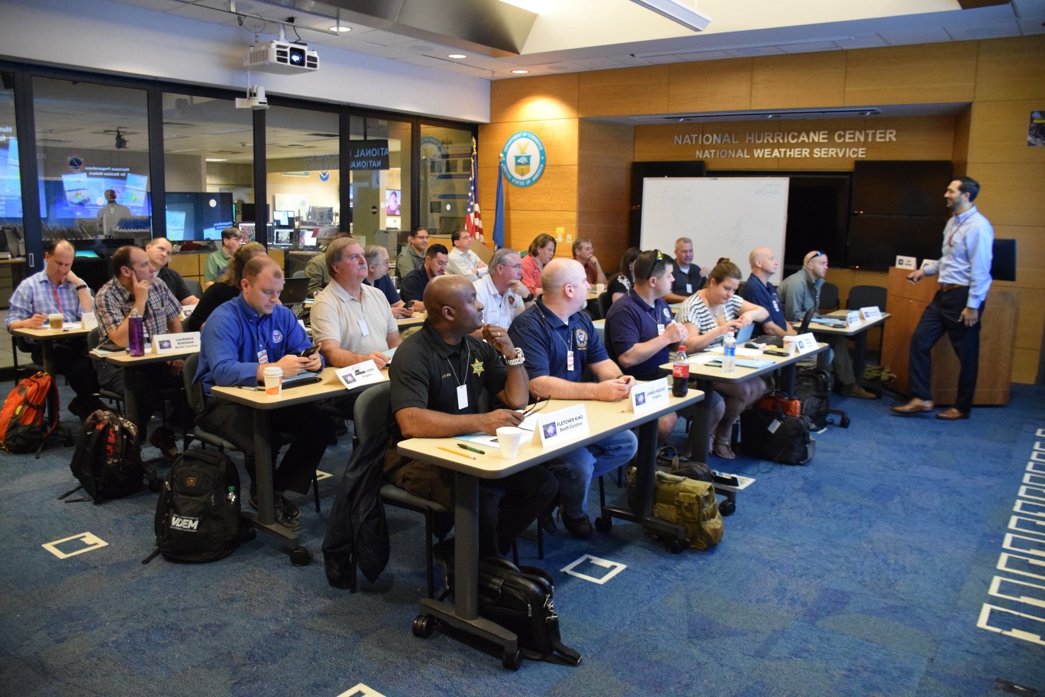 Brandon Bolinski teaches a class at the National Hurricane Center.