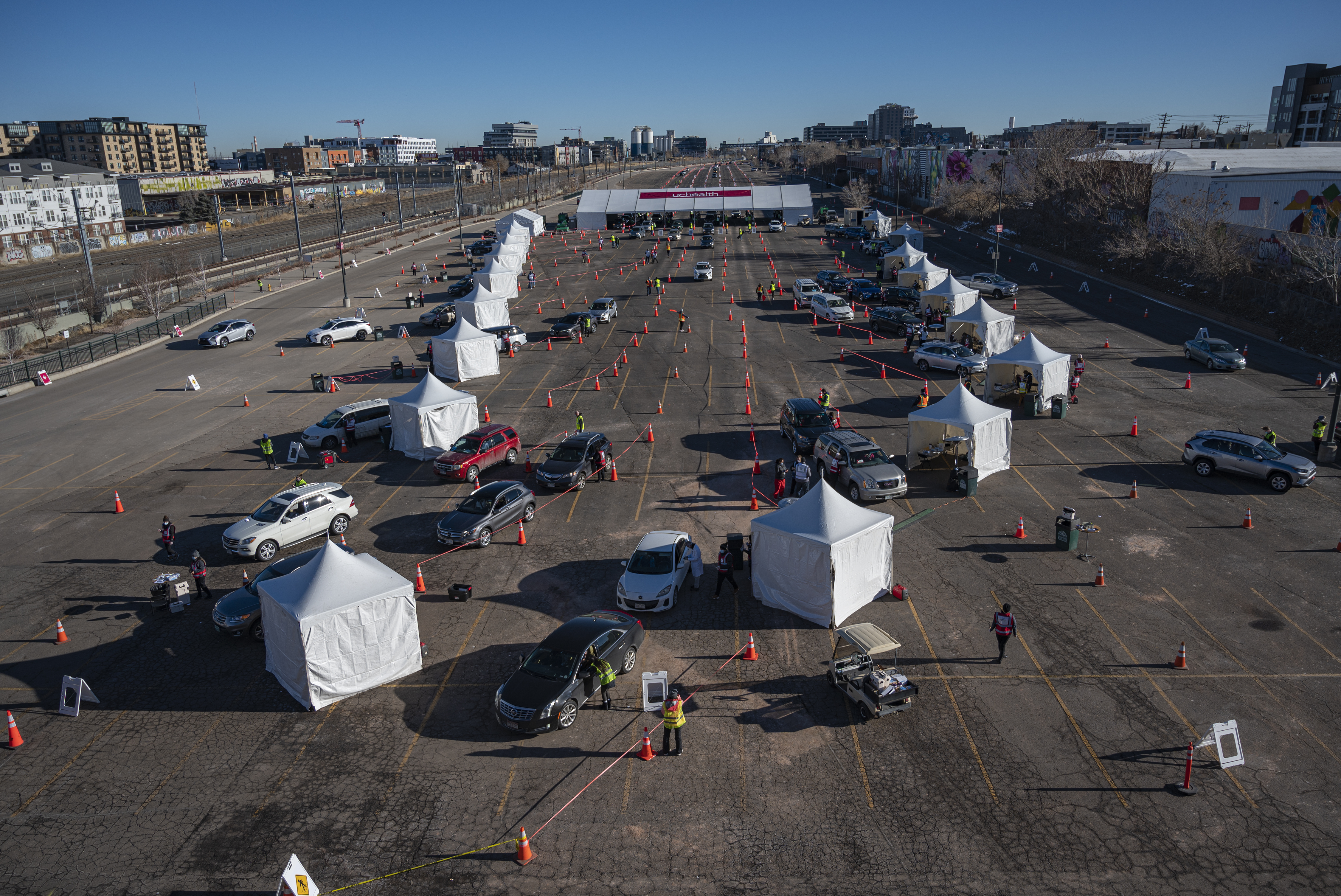 a parking lot of tents