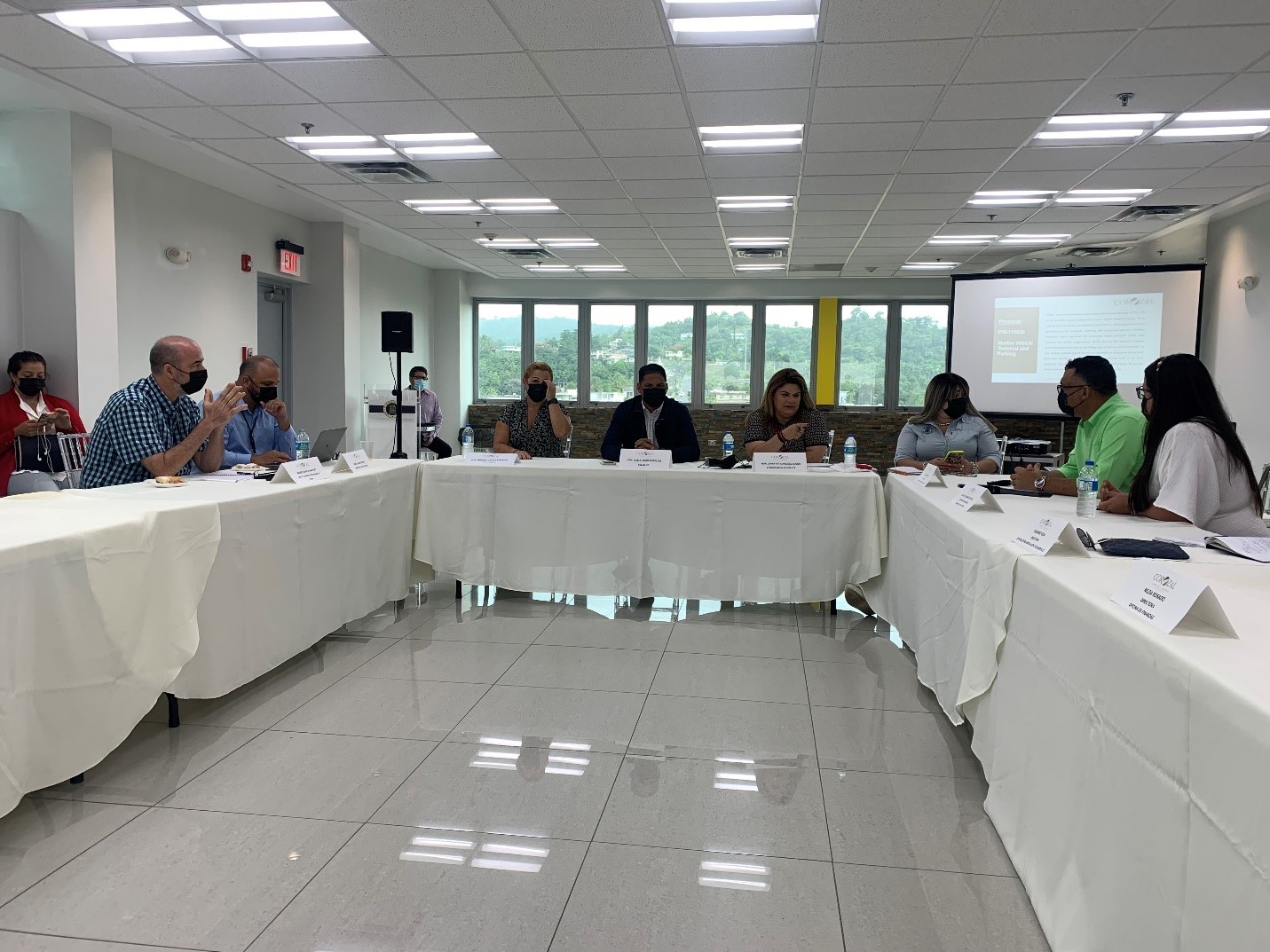 COR3 and FEMA officials in a meeting about ongoing recovery