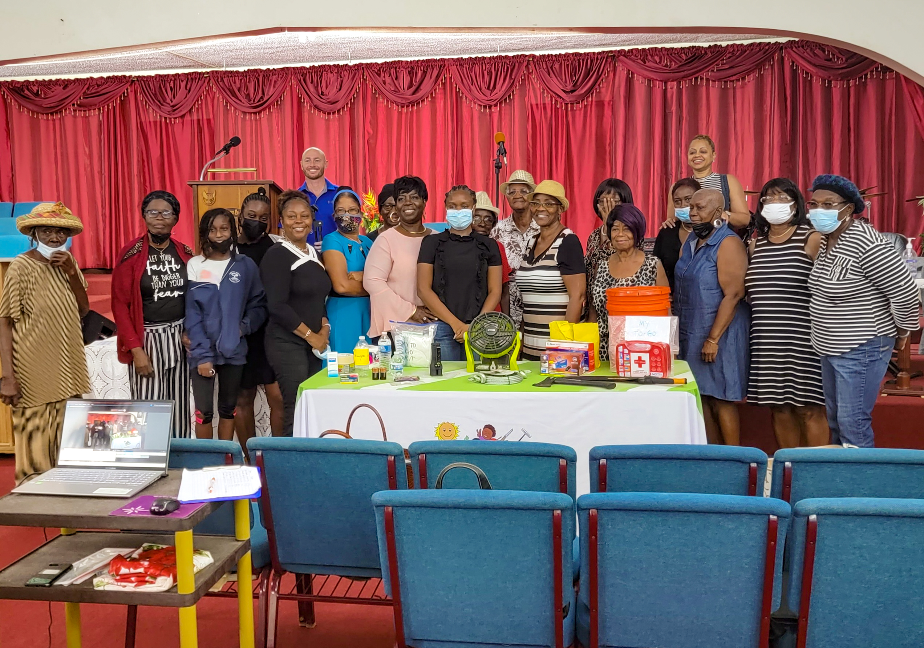 Delia Richardson, Executive Director for Community Engagement for the St. Croix Long Term Recovery Group, and Aaron VanDoren, U.S. Virgin Islands FEMA Integration Team lead, engage with the audience in May 2022 during a disaster preparedness event at First Assembly of God on St.