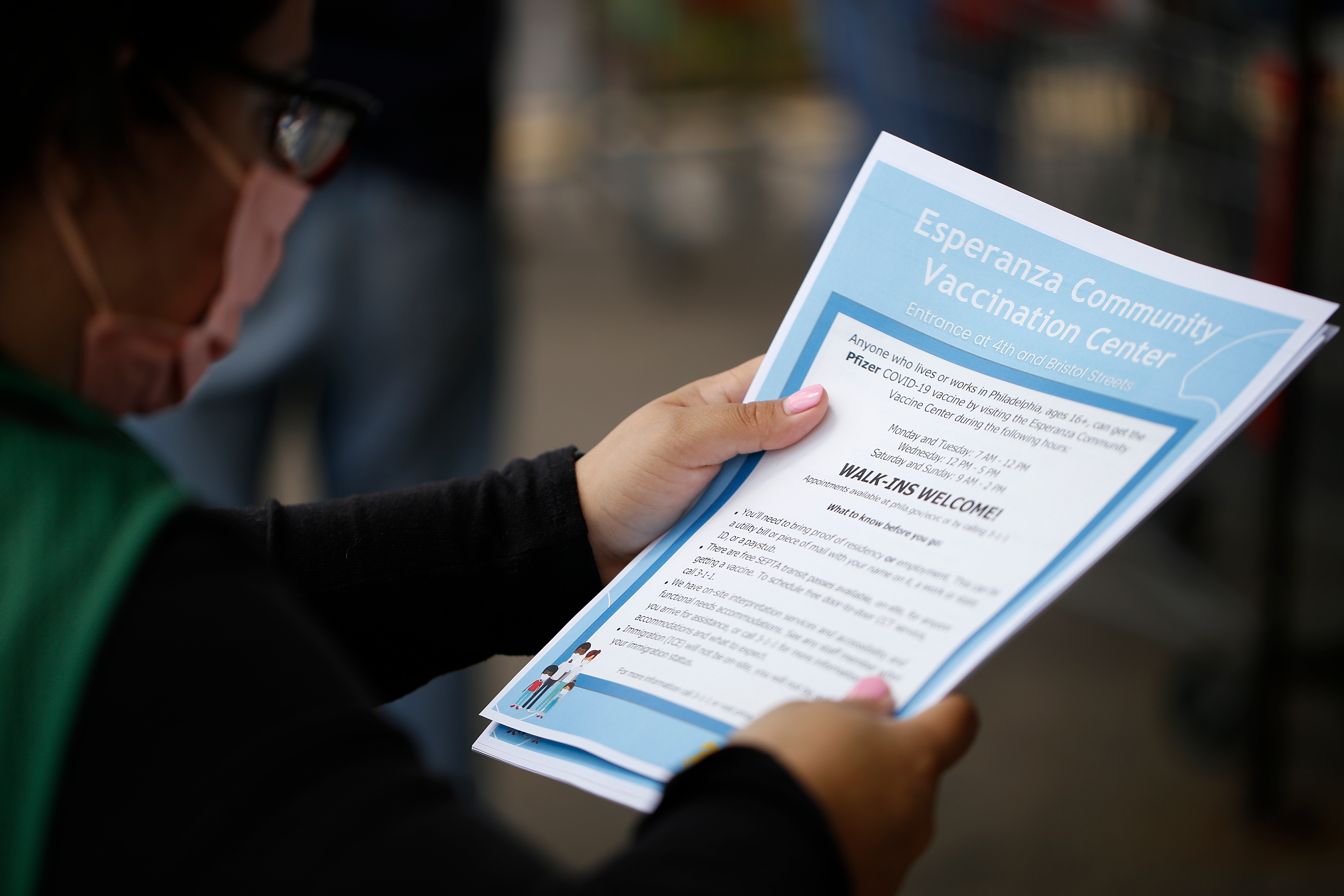 FEMA staff assisted in the distribution of flyers like this one with information about what to expect during a visit to the Esperanza Community Vaccination Center.