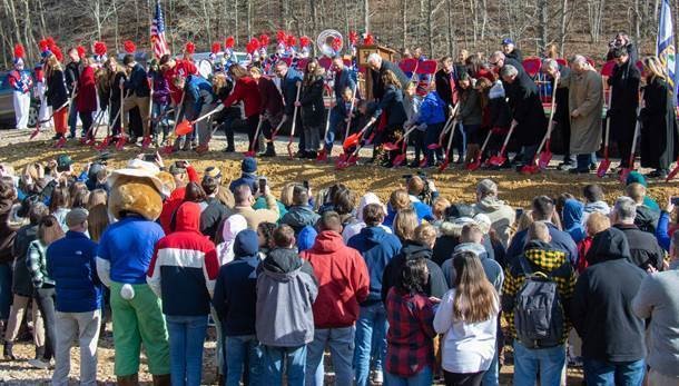 West Virginia Gov. Jim Justice, members of the Kanawha County Board of Education, county officials and students of Herbert Hoover High School participated in a January 2020 groundbreaking ceremony for a new Hoover High near Elkview.