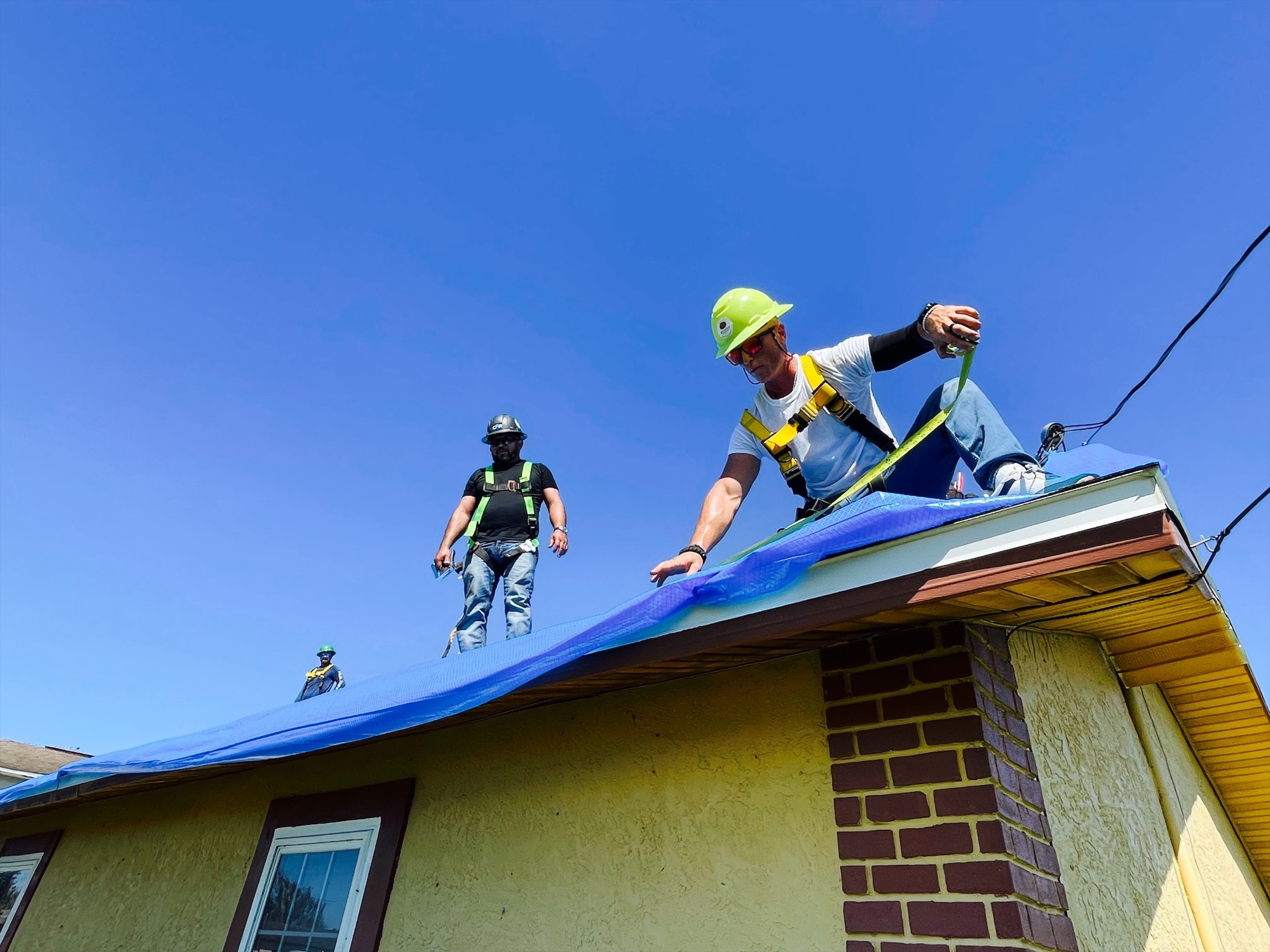 U.S. Army Corps of Engineers install coverings on roofs, as part of the Operation Blue Roof program, to assist Hurricane Ian survivors. Operation Blue Roof is a priority mission that provides homeowners in disaster areas with fiber-reinforced sheeting to cover their damaged roofs until arrangements can be made for permanent repairs