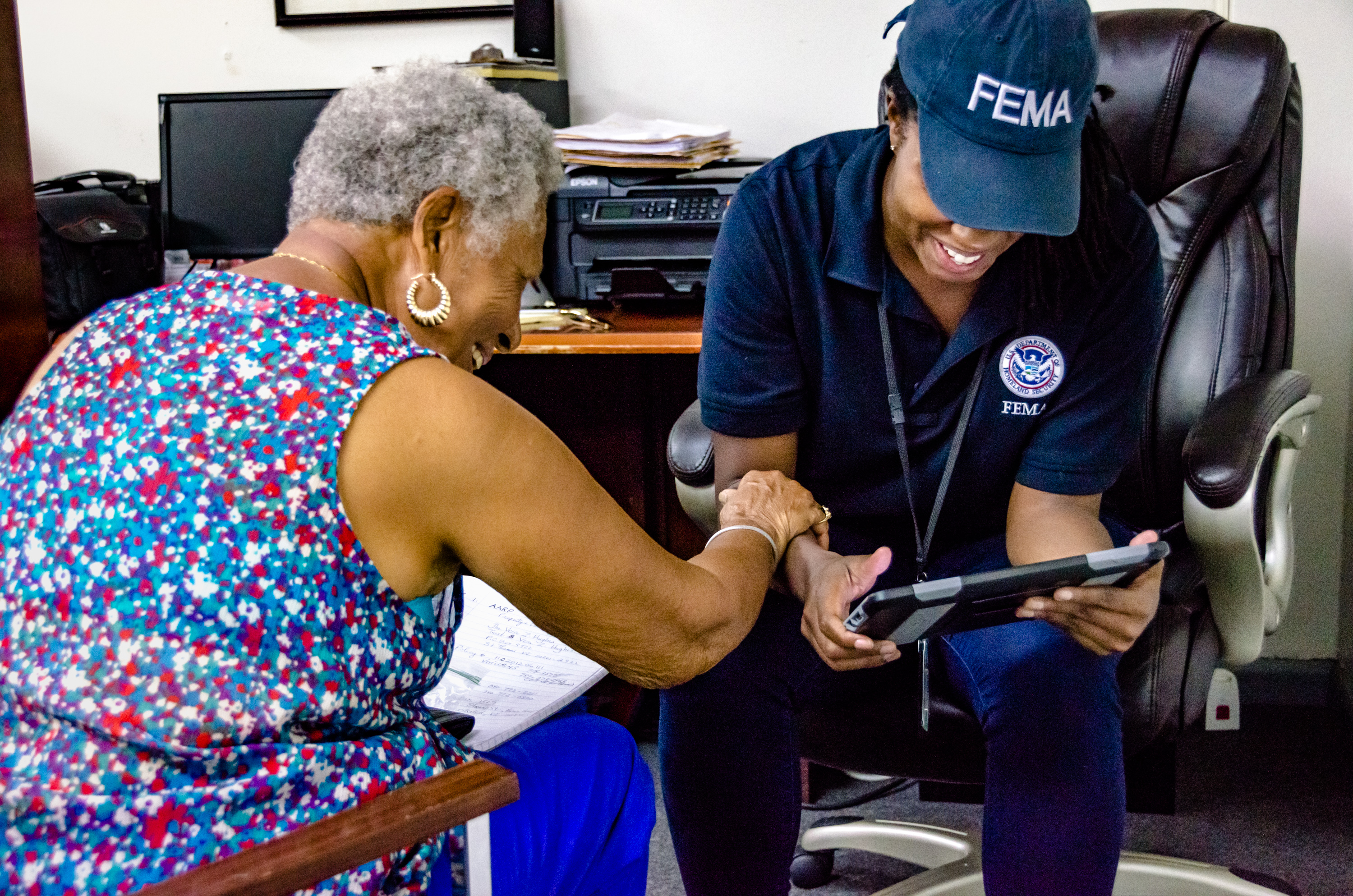 FEMA Disaster Survivor Assistance team talking to a survivor in St. Thomas