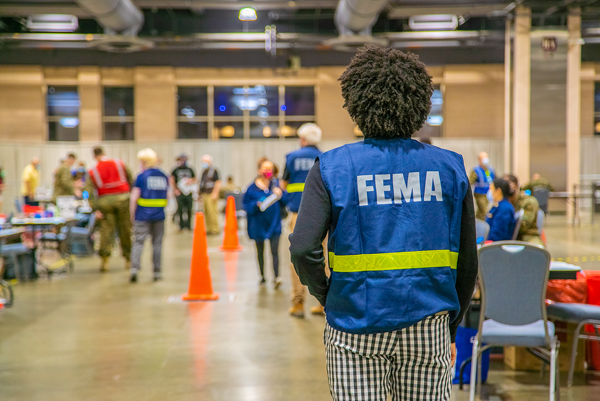 FEMA employee working in a field location