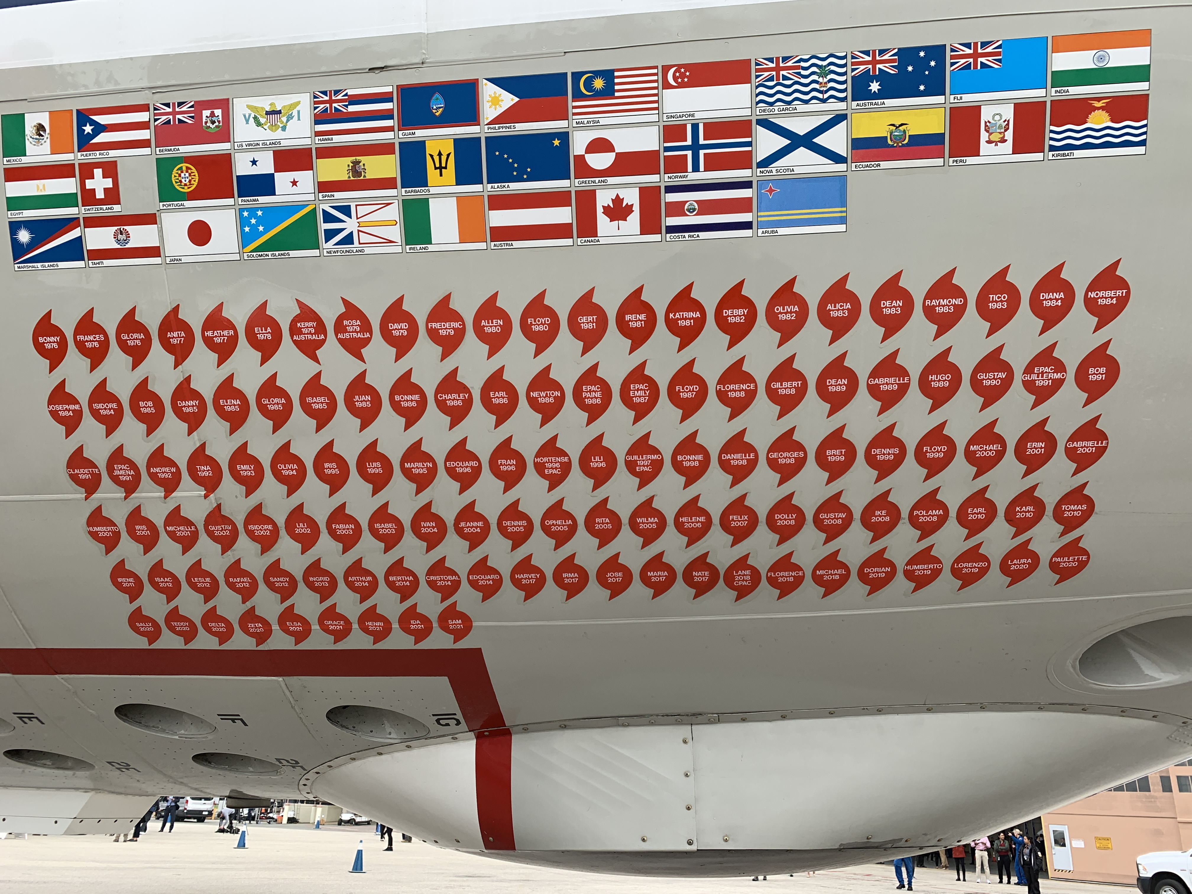Each time the aircraft “Kermit” intercepts a hurricane, a decal is added listing the storm’s name and year. 