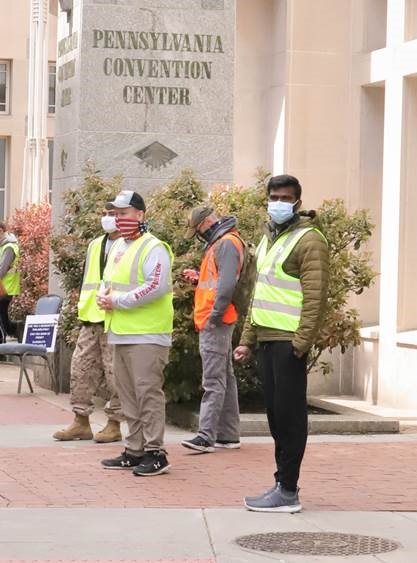 Sewa volunteers work alongside other volunteer organizations, like Team Rubicon, as well as the Pennsylvania National Guard to support the Center City Vaccination Center .