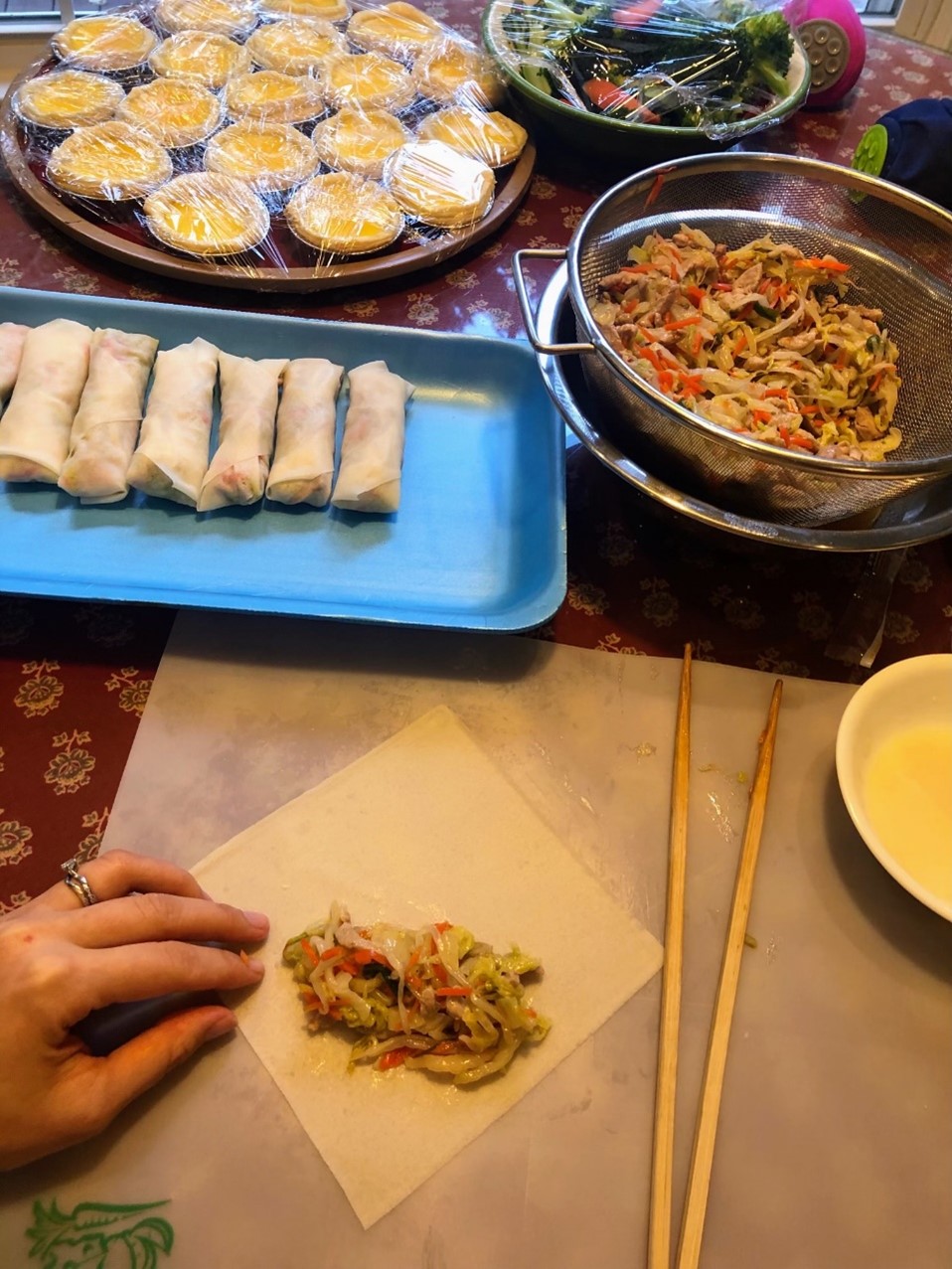 Perfecting the technique to wrap spring rolls takes patience and practice.