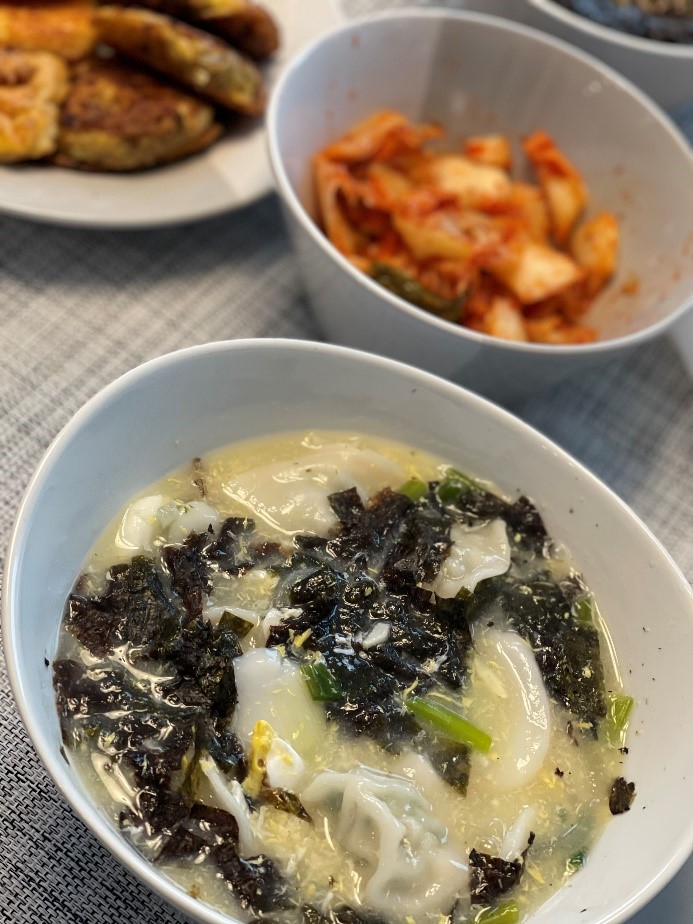 For Lunar New Year, Koreans traditionally eat ddukgook, a rice cake soup.