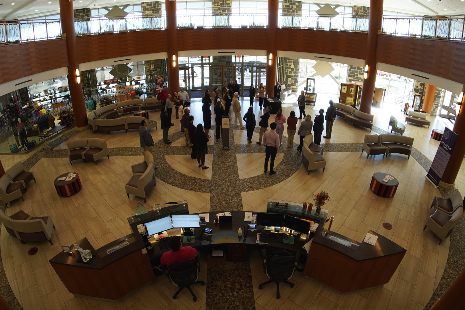 National Advisory Council members receive a tour of the Choctaw Nation headquarters. The building incorporates cultural features with each floor representing a different element of nature. 