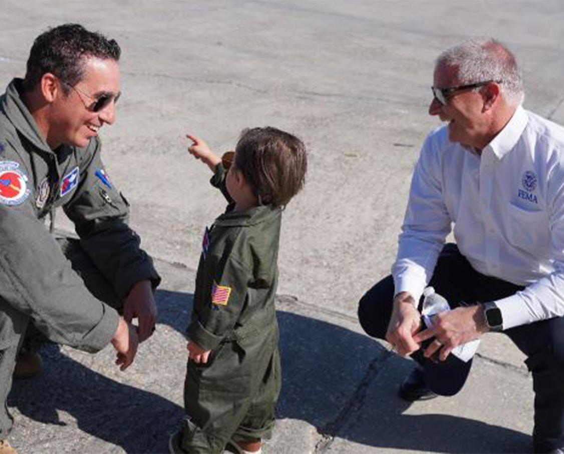 FEMA Region 6 Regional Administrator Tony Robinson with John Gharbi and son at Lakefront Airport New Orleans.
