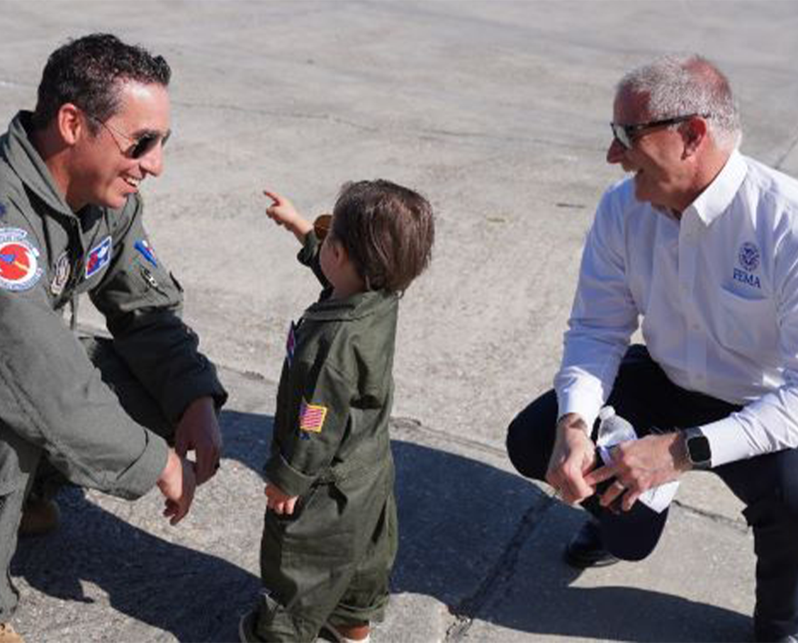 FEMA Region 6 Regional Administrator Tony Robinson with John Gharbi and son at Lakefront Airport New Orleans. 