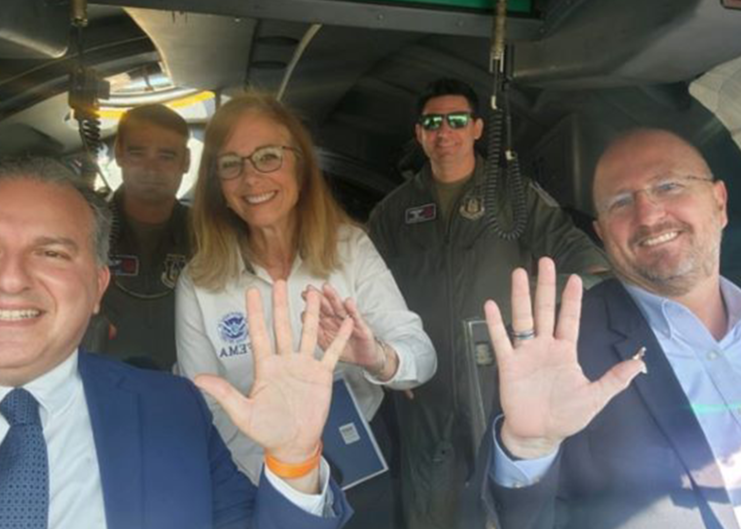 (from left to right) Florida Chief Financial Officer Jimmy Patronis, FEMA Region 4 Regional Administrator Gracia Szczech and Florida Division of Emergency Management Director Kevin Guthrie with flight crew at Tallahassee International Airport. 