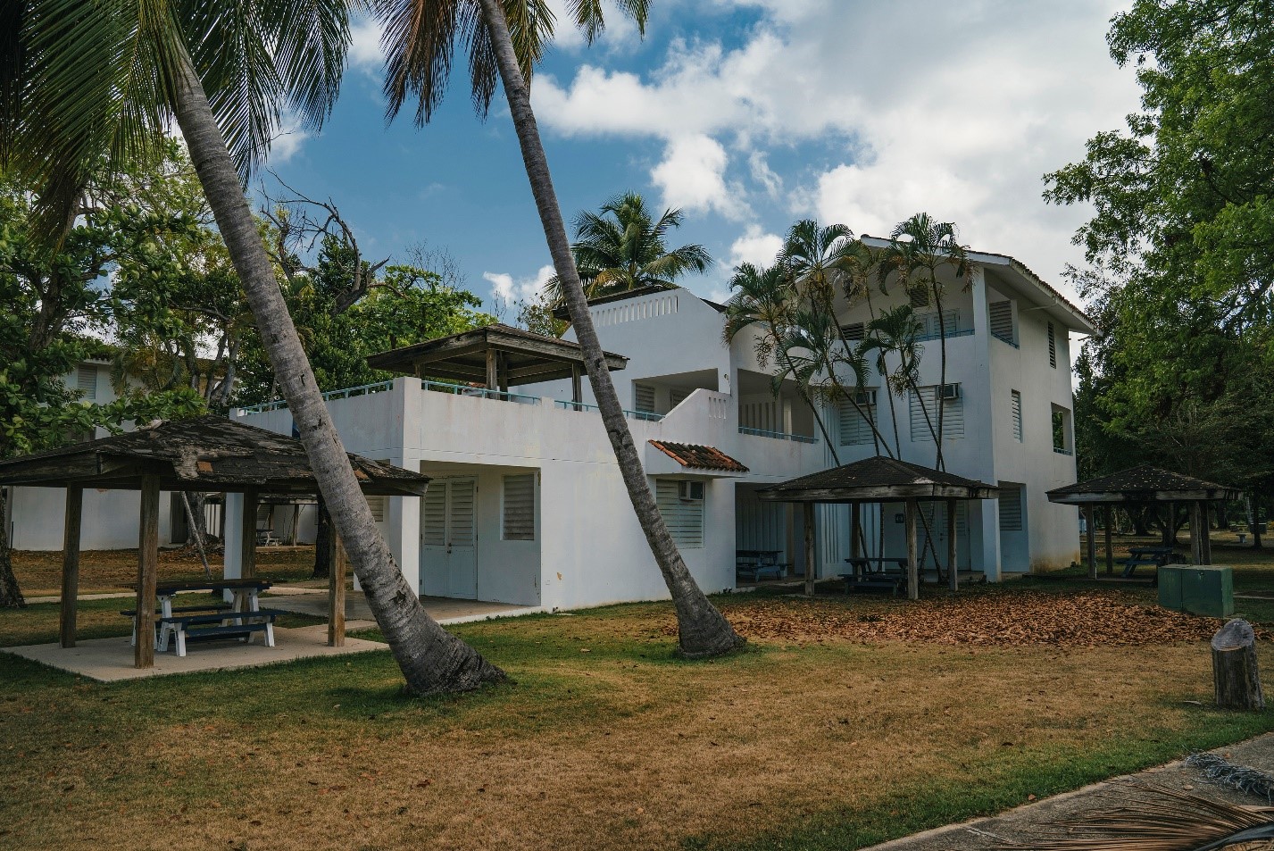 A white multiple floors building in the Punta Santiago Vacation Center.