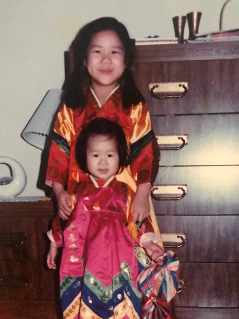 Seong Kim and her older sister dressed in hanbok to celebrate the Seollal feast.