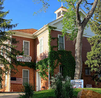 The Lyons Redstone Museum was damaged in the 2013 floods, but was later restored. Originally the schoolhouse in Lyons, the museum now preserves the town’s heritage through exhibits, photographs, and genealogy records.