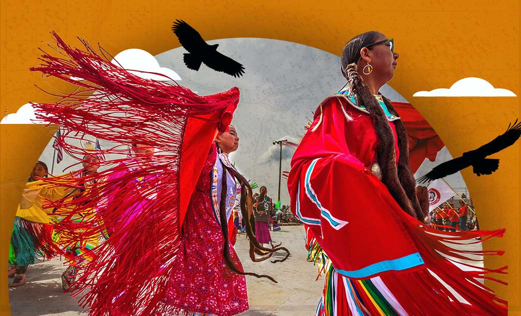 Women in traditional dress participating in a powwow