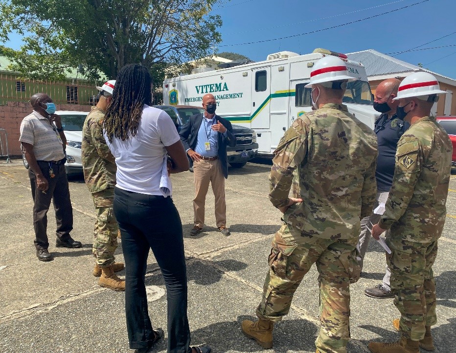 Daryl Jaschen, Director of the Virgin Islands Territorial Emergency Management Agency, meets with soldiers from the Alpha Company of the 249th Engineer Battalion of the U.S Army Corps of Engineers outside VITEMA’s Emergency Operations Center in Christiansted.