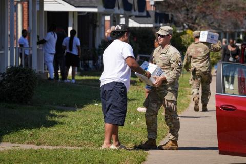 Caption: Asheville, N.C. (Oct. 8, 2024) - U.S. Army 101st Airborne Division distribute food and water to residents in Asheville, N.C.,
