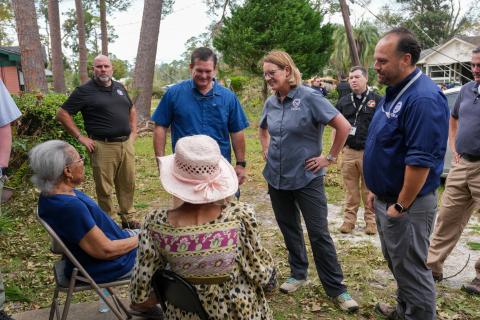 Caption: VALDOSTA, GA – FEMA Administrator Deanne Criswell, FEMA Region 4 Regional Administrator Robert Samaan and Georgia Rep. Austin Scott, visit Helene survivors in front of their home in Valdosta GA. 