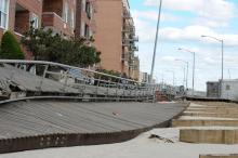  A boardwalk is destroyed by the onslaught of Hurricane Sandy in Rockaway, New York. 