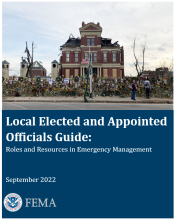 Picture is of a building with a fence and people in front of it. Text reads Local Elected Officials Guide: Roles and Resources in Emergency Management