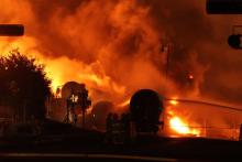 Orange and red sky coming off the fire from a train detrailment