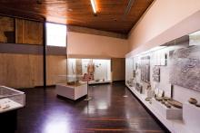 Inside view of the Tibes Ceremonial Center Museum showing indigenous artifacts.