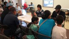 FEMA personnel helps survivors register for assistance