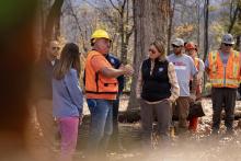 ASHEVILLE, North Carolina - FEMA Administrator Deanne Criswell visits the A-B Tech Enka Campus staging site Nov. 9, 2024. FEMA is working closely with federal, state and local government partners, non-profits and faith-based organizations for a new wood project.