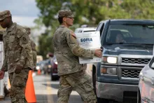 national guard distributing supplies