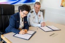 U.S. Fire Administrator Dr. Lori Moore-Merrell signs a discusses Memorandum of Understanding with the Israel Fire and Rescue Authority Commissioner Lt. General Eyal Caspi at the Fire Authority Headquarters Nov. 30.