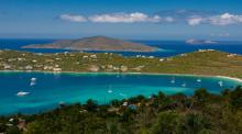 The turquoise waters of Magens Bay stand out amid two emerald-green peninsulas on the north end of St. Thomas. 