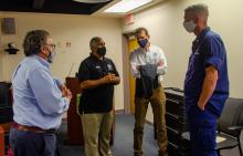 Region 2 Preparedness Division Director Russell Fox, (from left), U.S. Virgin Islands Caribbean Area Office Coordinator Mark A. Walters, Region 2 Acting Administrator Thomas Fargione and U.S. Coast Guard Lt. Cmdr. JJ League discuss hurricane preparedness for maritime operations during an Emergency Management Council Meeting at the V.I. Territorial Emergency Management Agency's Emergency Operations Center.