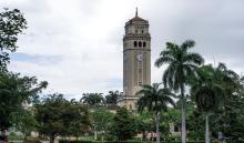 View of University of Puerto Rico's Tower sorrounded by trees. 
